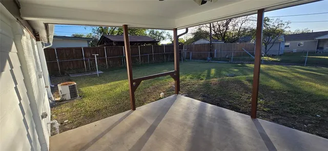 a view of a porch with garden