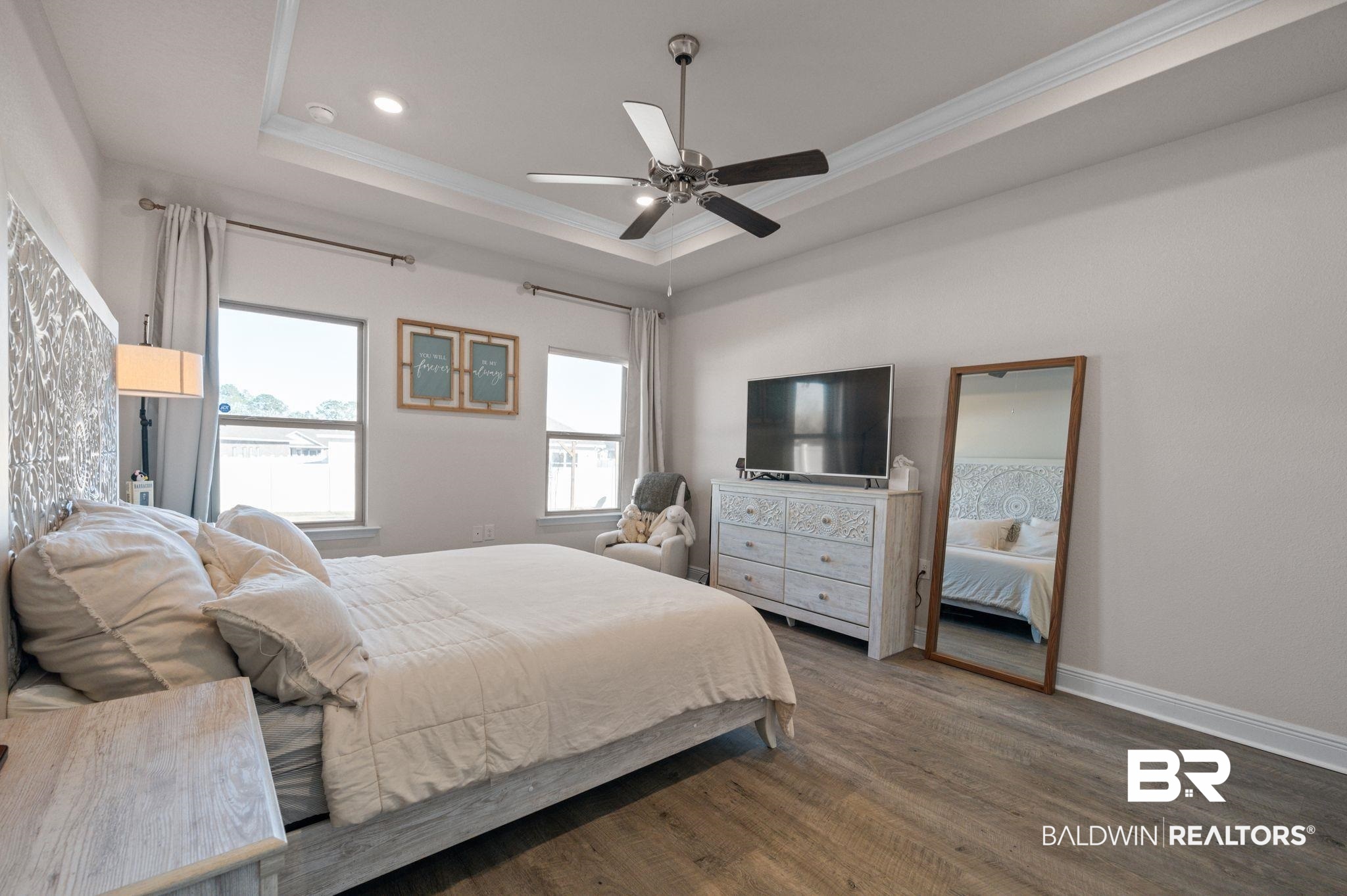 24891 Spectacular Bid Loop Daphne, AL 36526 - Photo 50 of 51 Bedroom with crown molding, hardwood / wood-style flooring, and a raised ceiling