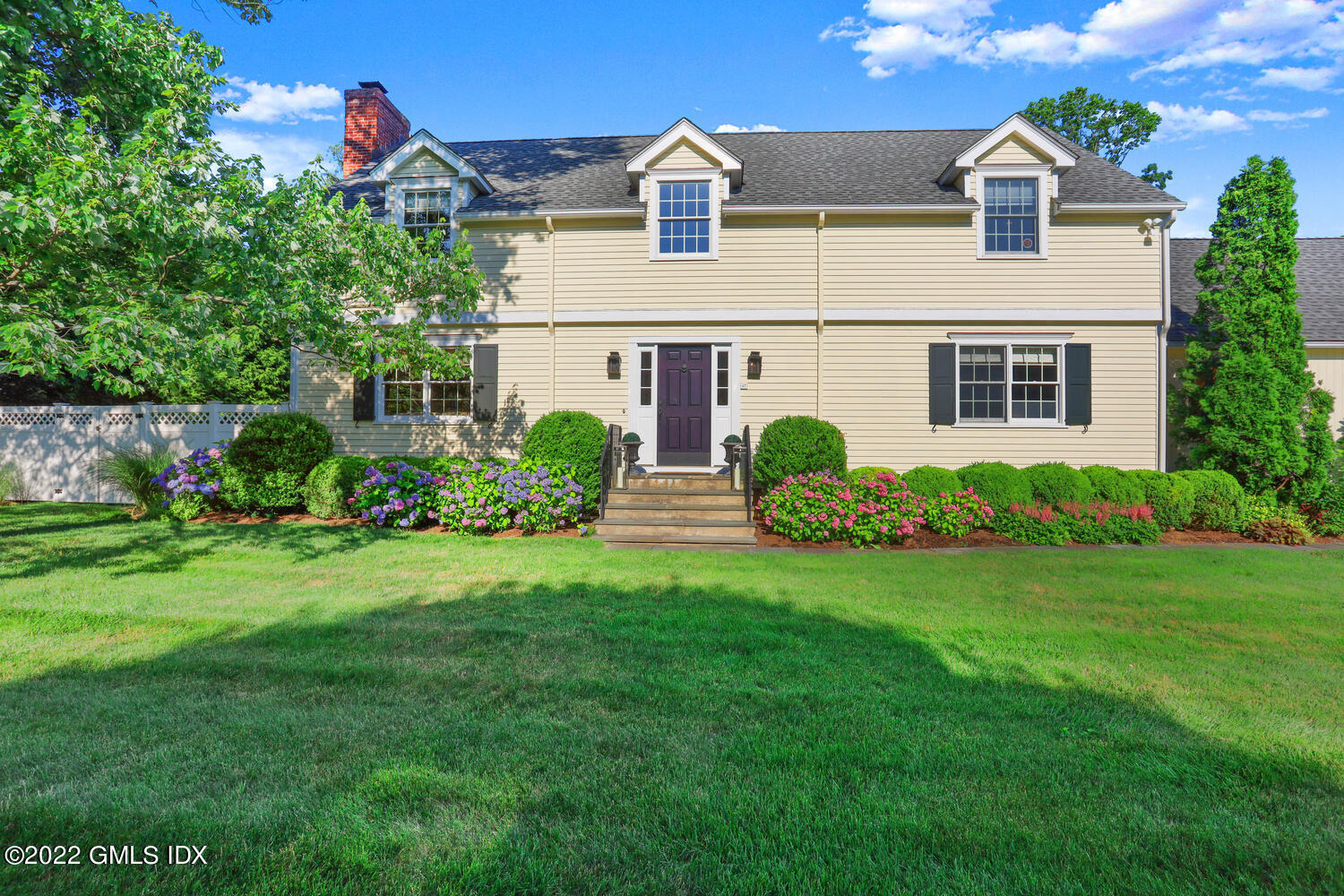 47 Druid Lane Riverside, CT 06878 - Photo 1 of 29 a front view of house with yard and green space