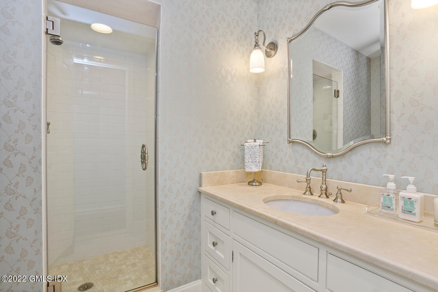47 Druid Lane Riverside, CT 06878 - Photo 11 of 29 a bathroom with a sink and a mirror