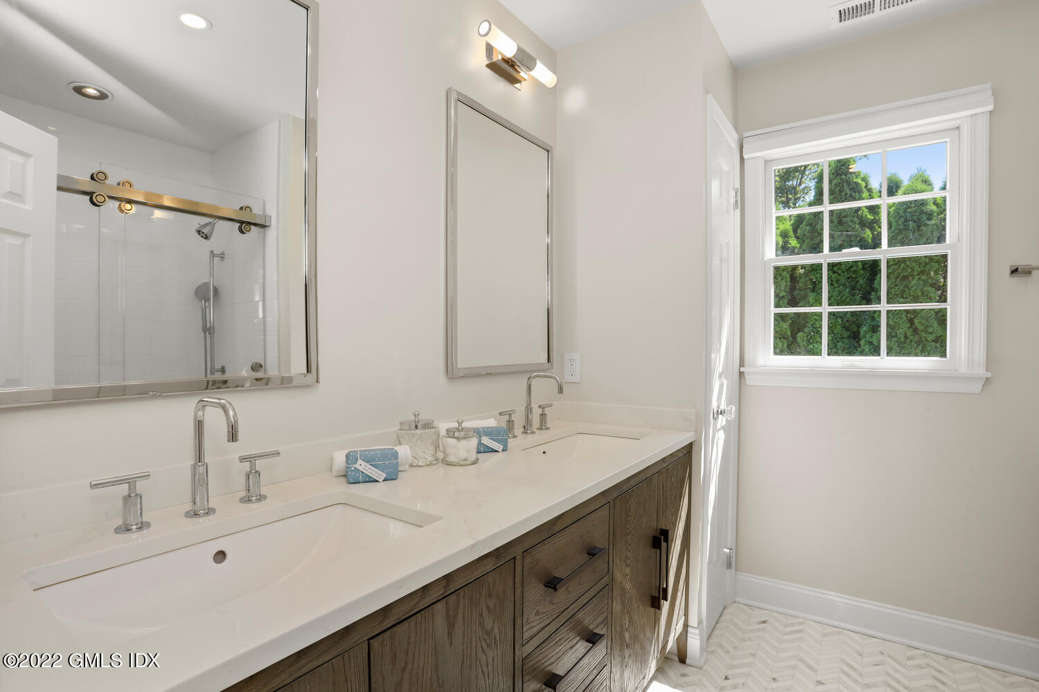 47 Druid Lane Riverside, CT 06878 - Photo 19 of 29 a bathroom with a double vanity sink mirror and double