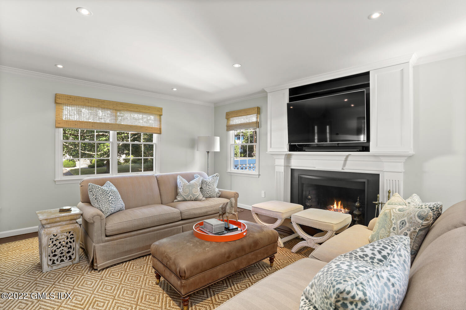 47 Druid Lane Riverside, CT 06878 - Photo 3 of 29 a living room with furniture and a fireplace