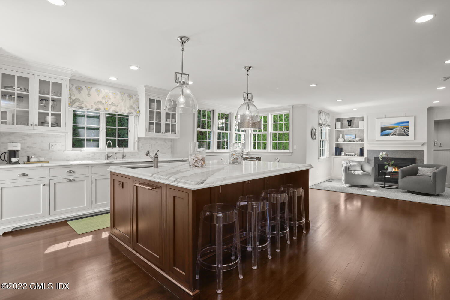 47 Druid Lane Riverside, CT 06878 - Photo 7 of 29 a kitchen with stainless steel appliances granite countertop a stove and kitchen island