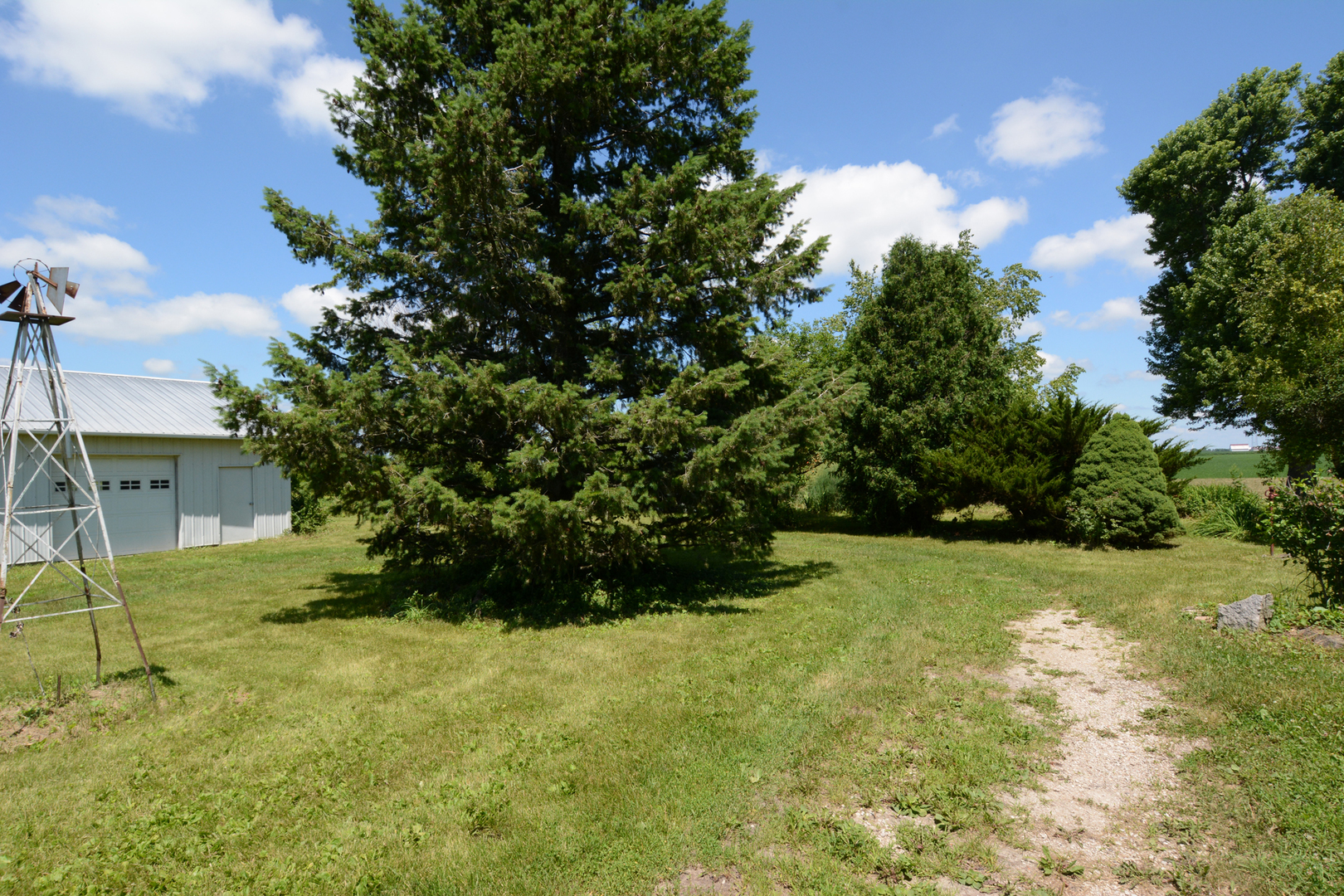 6115 South University Road Shabbona, IL 60550 - Photo 11 of 37 a view of a backyard