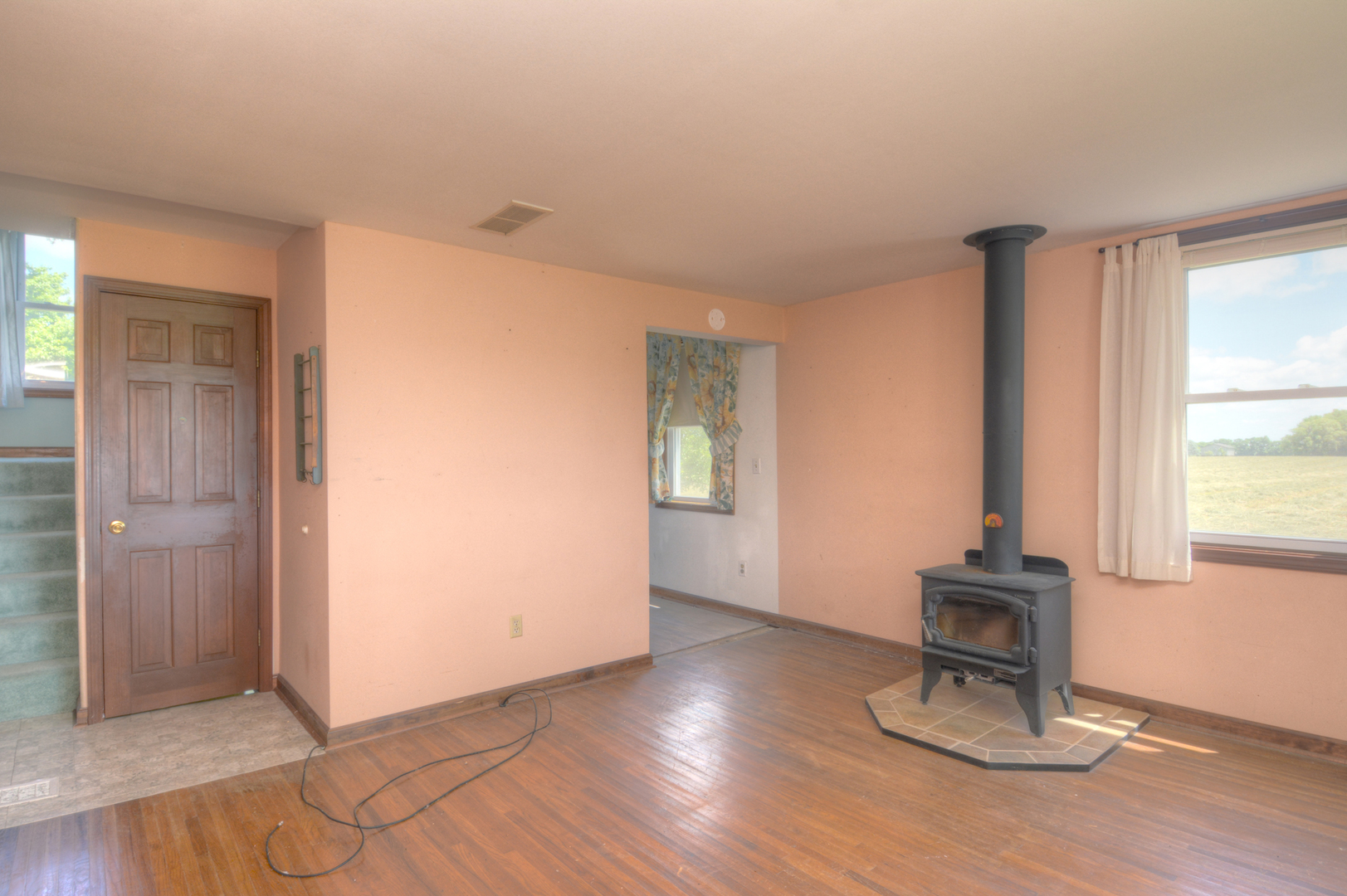 6115 South University Road Shabbona, IL 60550 - Photo 23 of 37 wooden floor in an empty room with a window