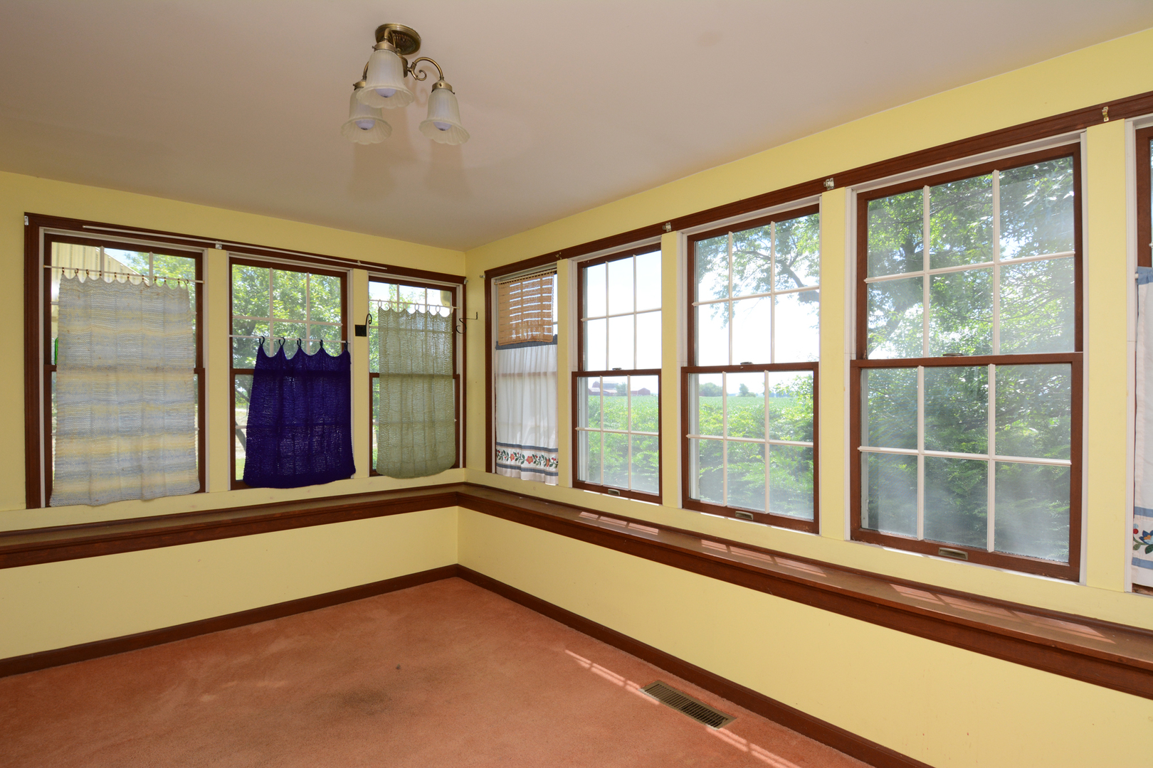 6115 South University Road Shabbona, IL 60550 - Photo 27 of 37 a view of an empty room with a large window