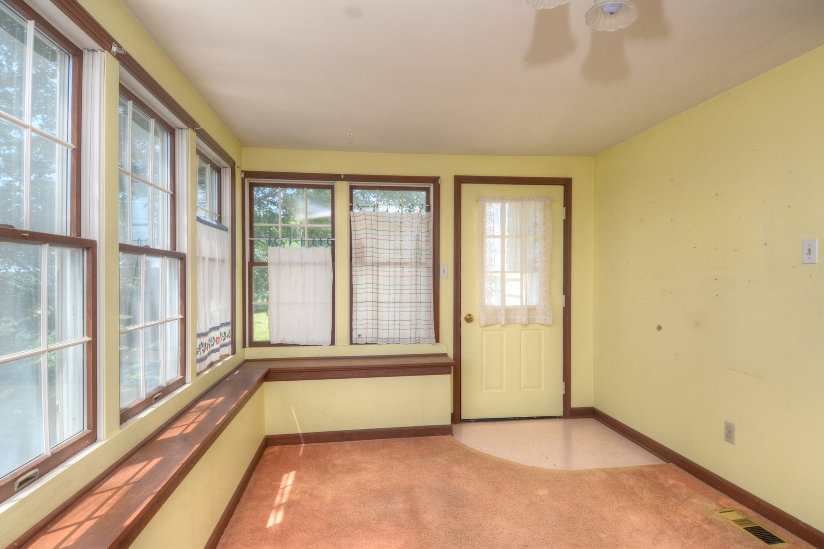 6115 South University Road Shabbona, IL 60550 - Photo 28 of 37 a view of an empty room with a large window
