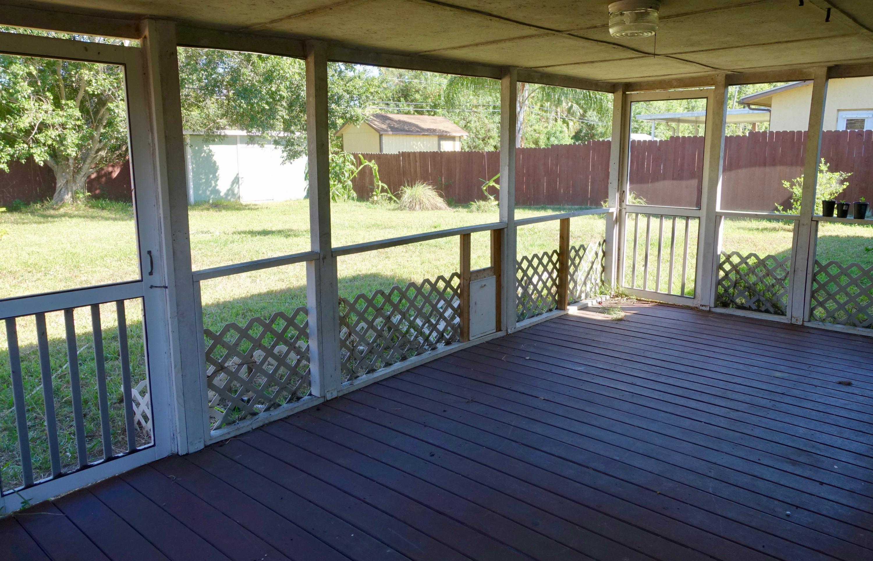 5619 Southeast Normandy Avenue Stuart, FL 34997 - Photo 14 of 16 5619 Normandy Porch 1