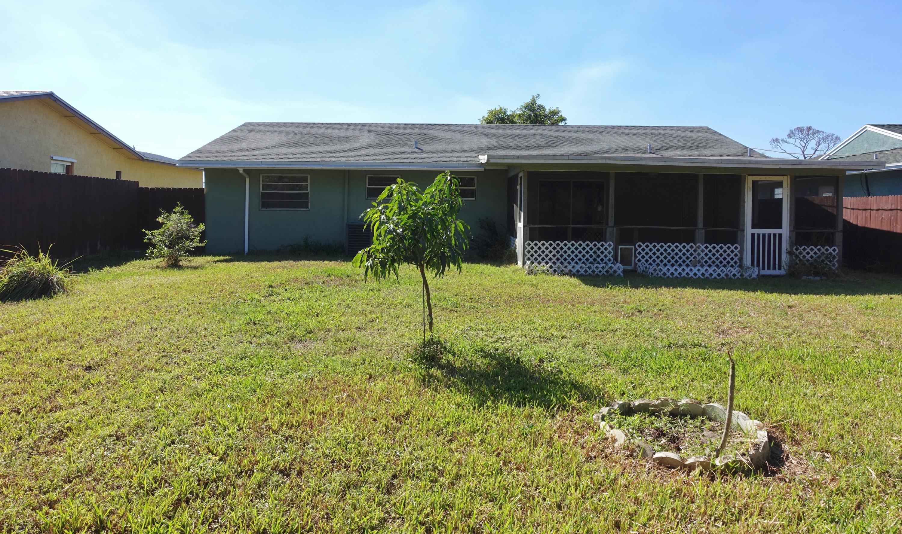 5619 Southeast Normandy Avenue Stuart, FL 34997 - Photo 15 of 16 5619 Normandy Rear View