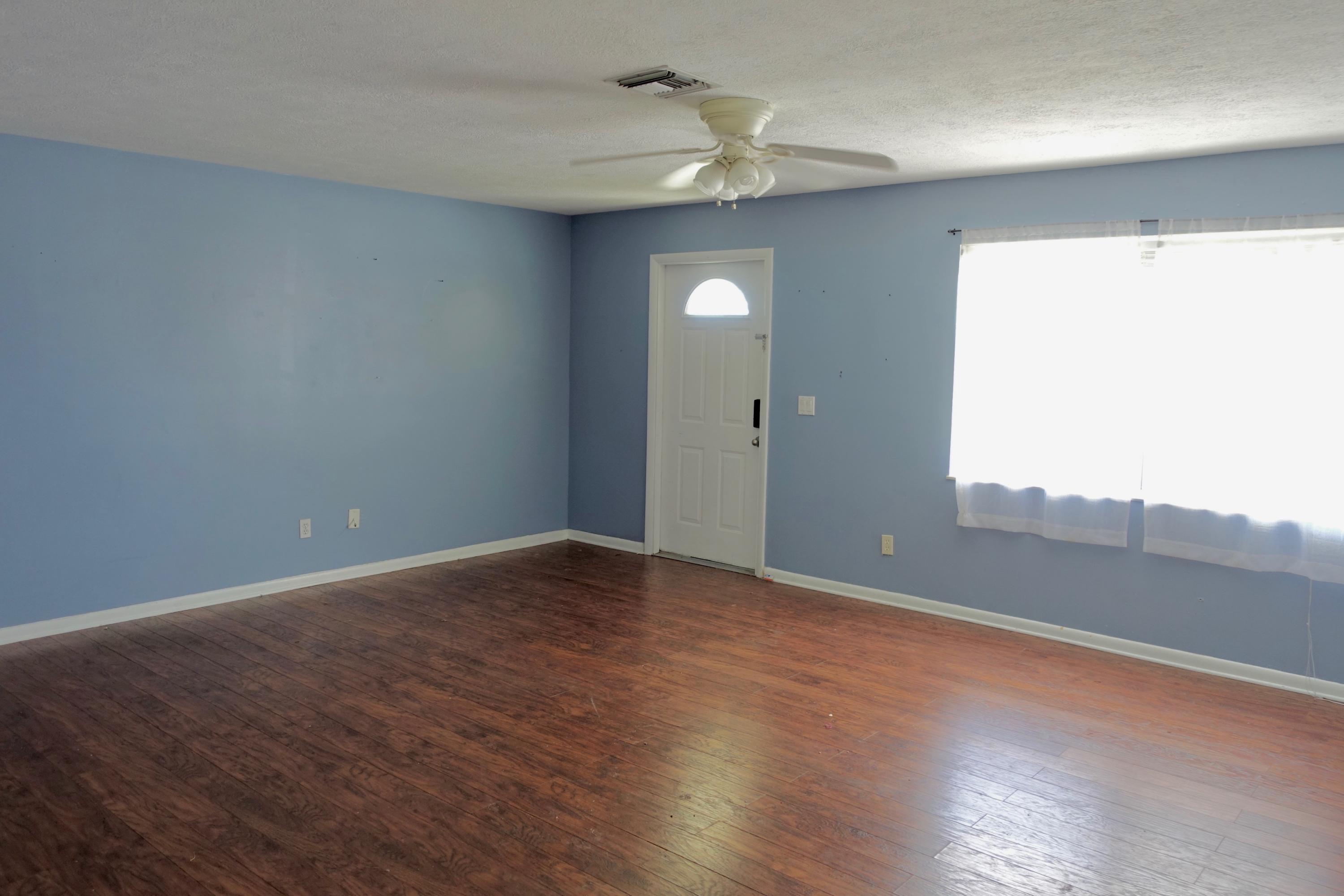 5619 Southeast Normandy Avenue Stuart, FL 34997 - Photo 3 of 16 5619 Normandy Living Room