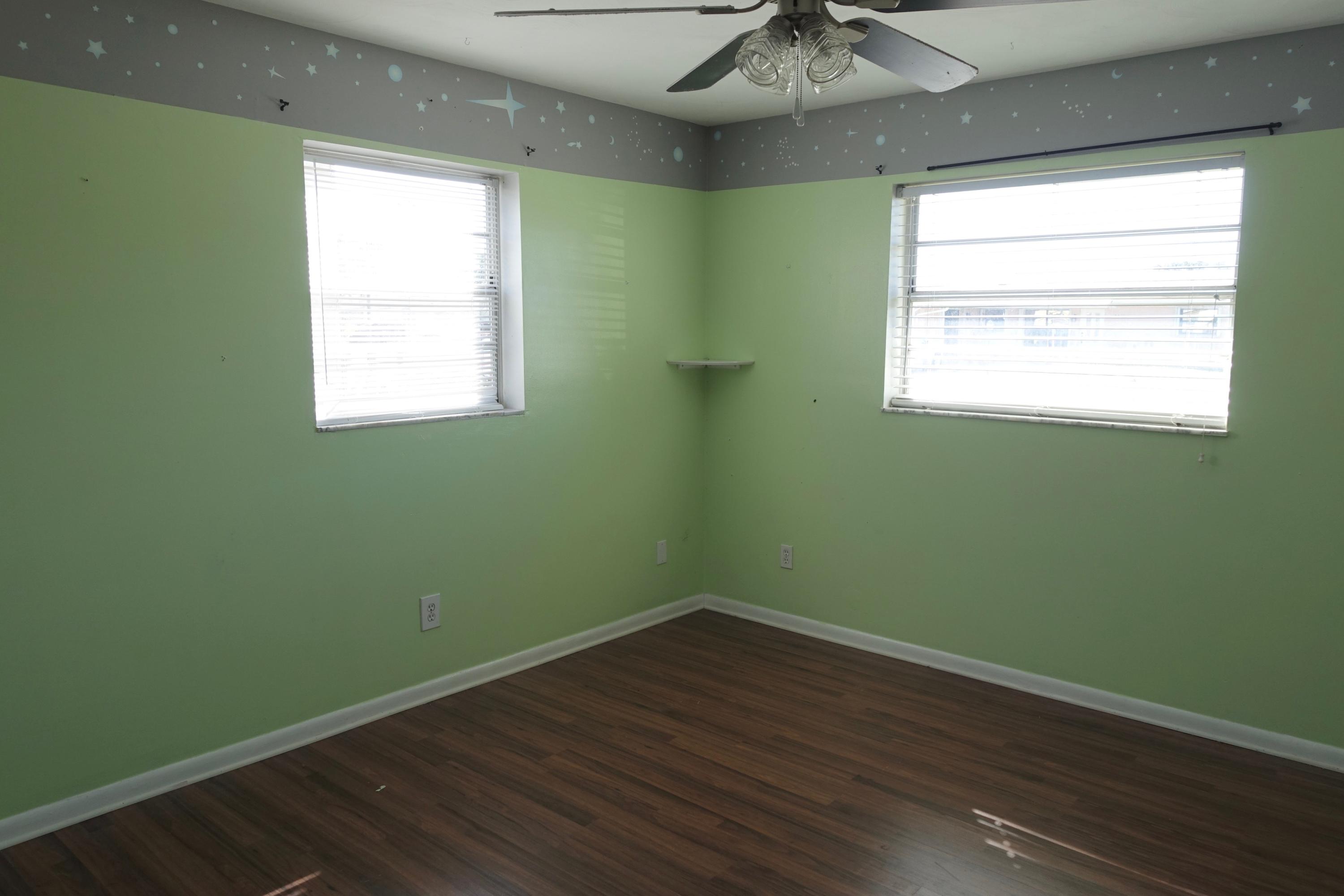 5619 Southeast Normandy Avenue Stuart, FL 34997 - Photo 9 of 16 5619 Normandy Bedroom 1