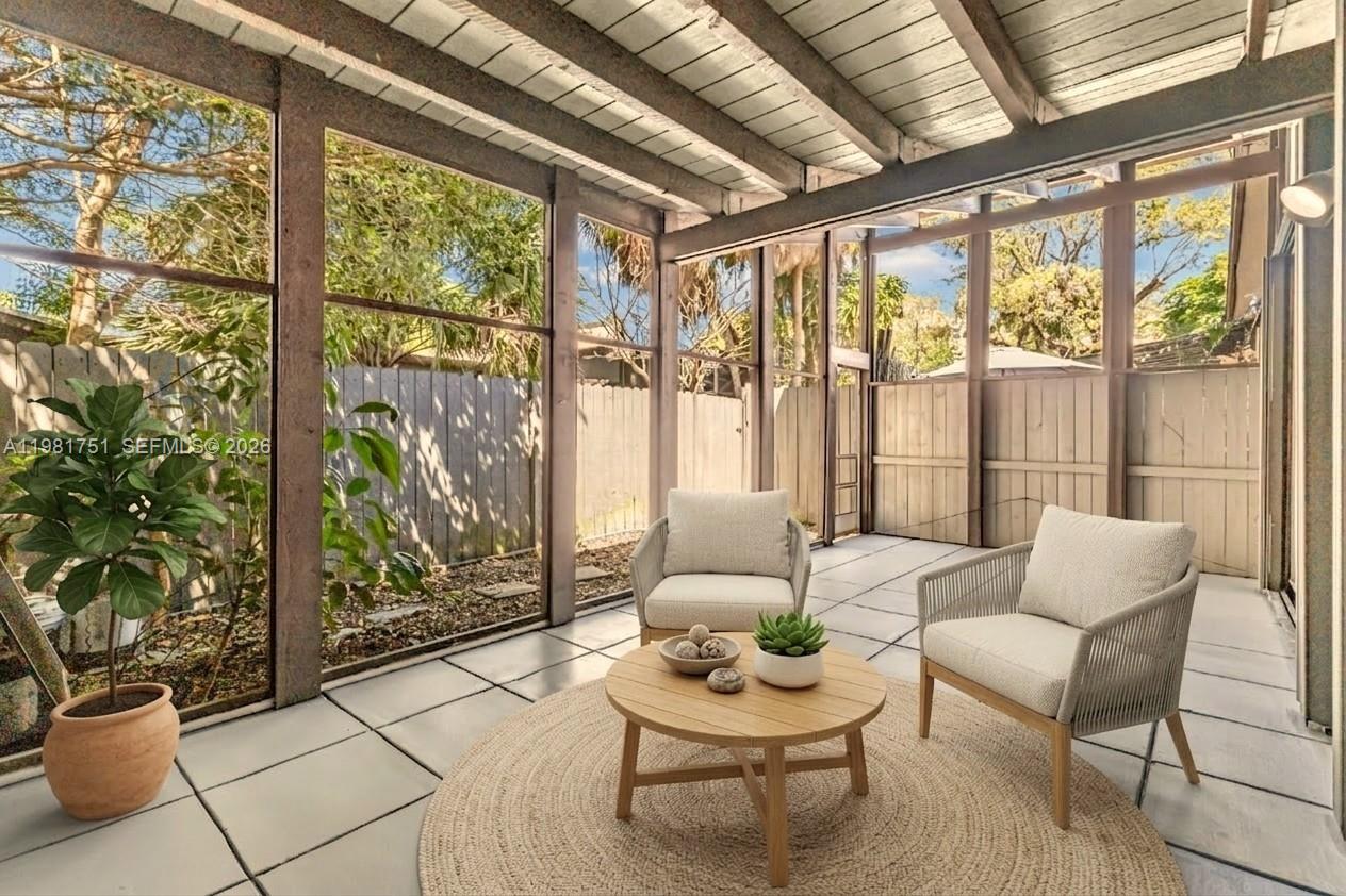 9332 Southwest 132nd Street Miami, FL 33176 - Photo 16 of 16 a living room with furniture and a potted plant
