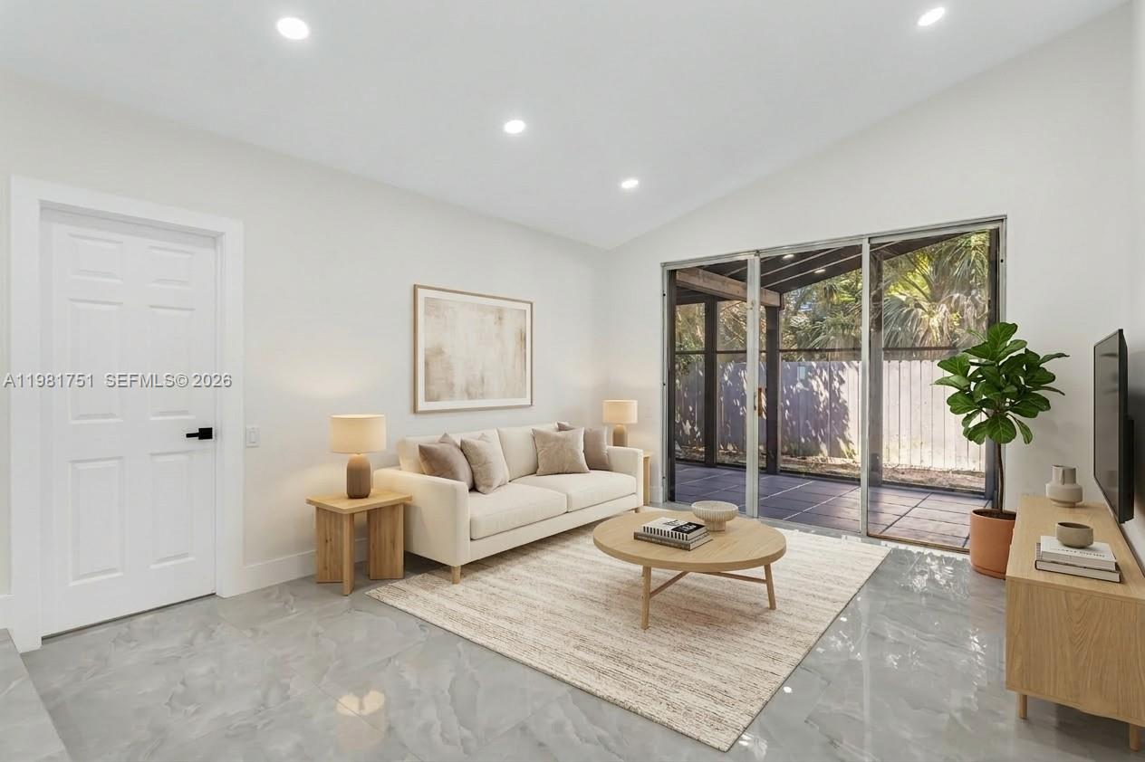 9332 Southwest 132nd Street Miami, FL 33176 - Photo 6 of 16 a living room with furniture and a large window