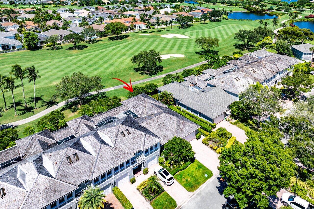 4023 Northwest 58th Street Boca Raton, FL 33496 - Photo 17 of 20 an aerial view of a house with a garden and lake view