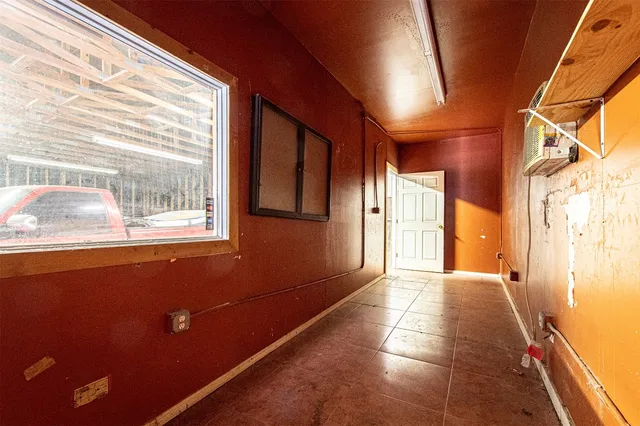 a view of a storage area with shoes and chairs