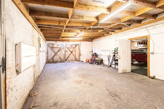 a bathroom with a toilet and shower