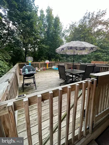 a roof deck view with patio