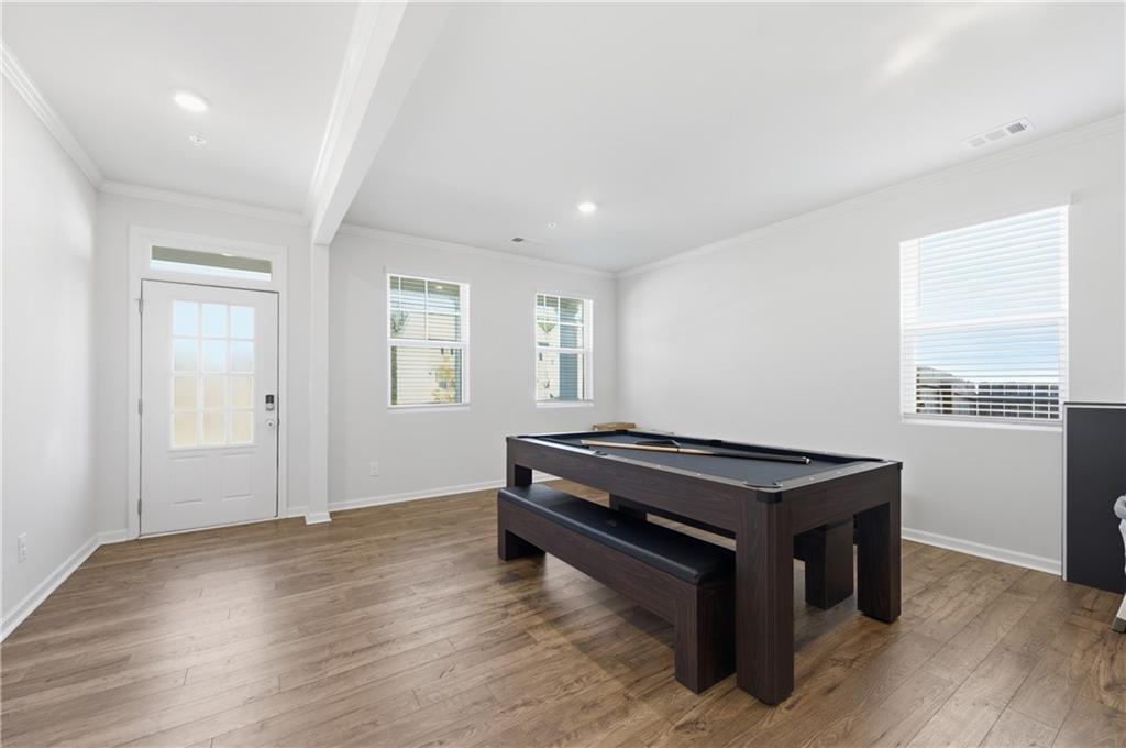 7565 Jennadee Drive Fairburn, GA 30213 - Photo 12 of 42 a room with wooden floors and window