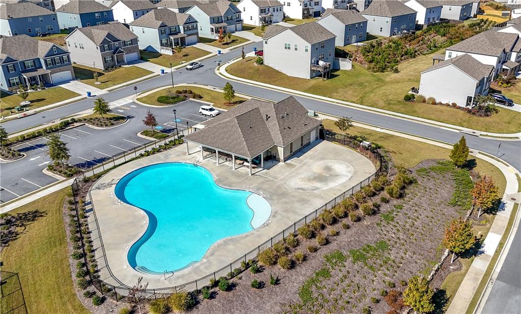 7565 Jennadee Drive Fairburn, GA 30213 - Photo 37 of 42 an aerial view of a swimming pool