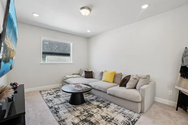 a living room with furniture and a couch