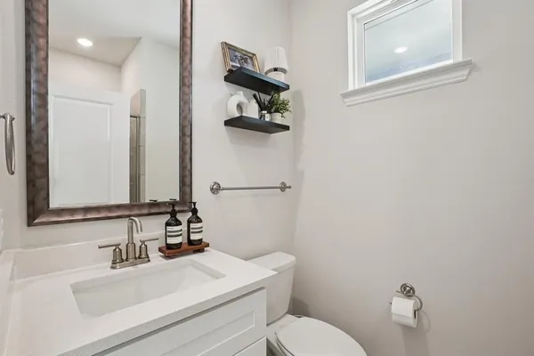 a view of two chairs in the balcony