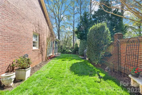 a view of a backyard with garden