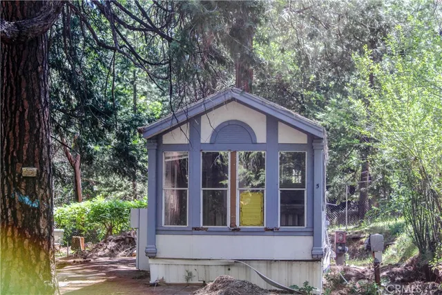 a front view of a house with a porch