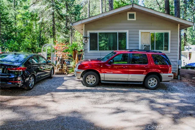 a car parked in front of a house