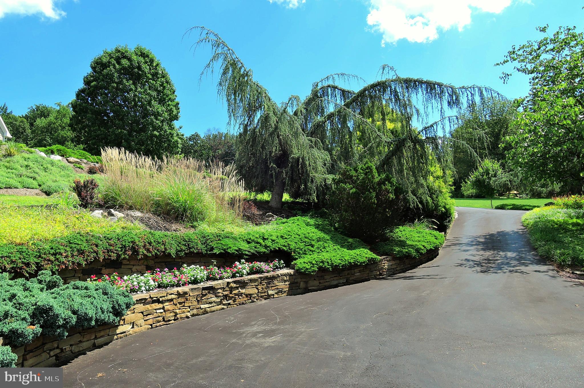 14 Wetherbee Court Phoenix, MD 21131 - Photo 61 of 64 Stone and landscaped driveway