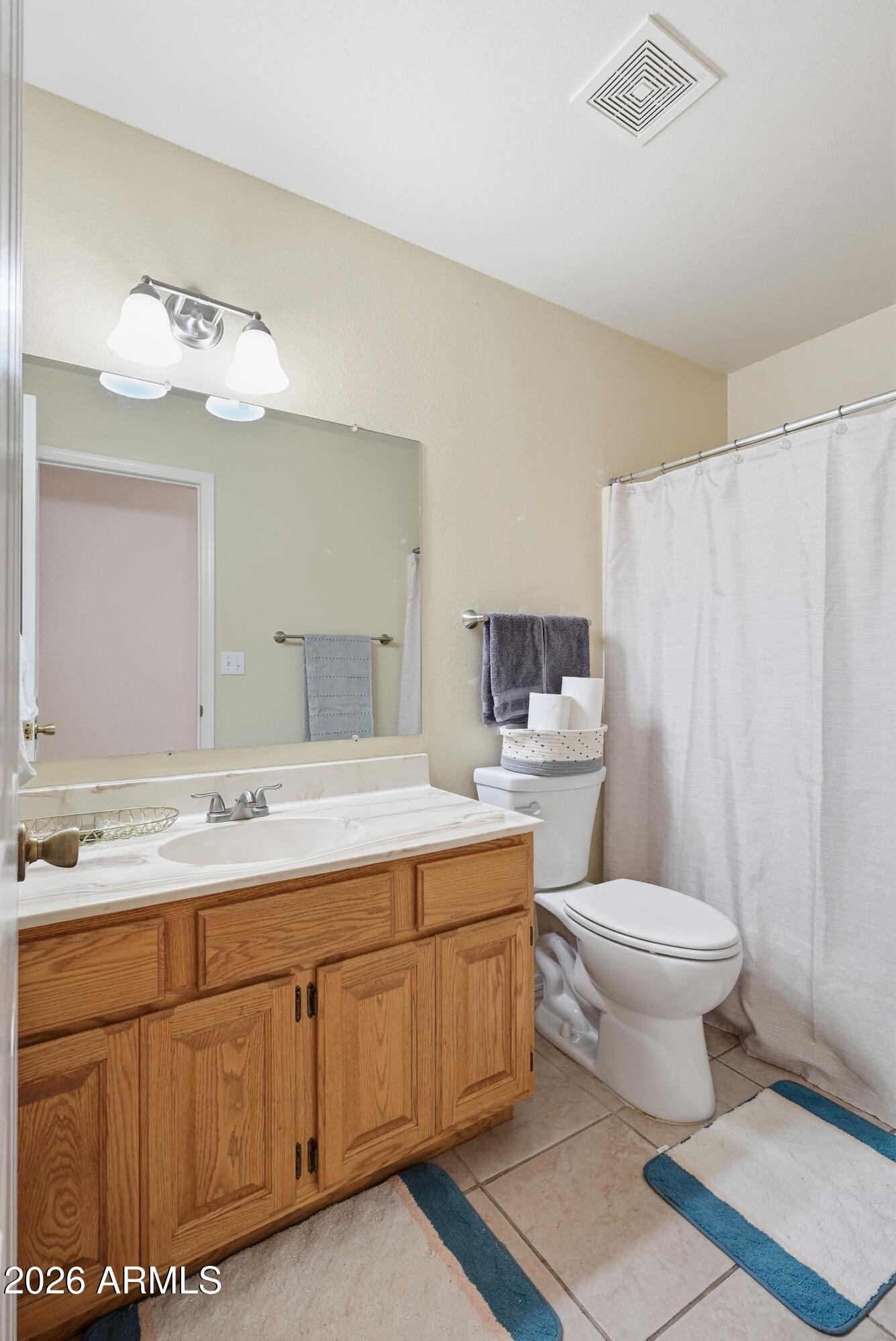 905 West Prairie Road Payson, AZ 85541 - Photo 22 of 38 a bathroom with a double vanity sink mirror and toilet