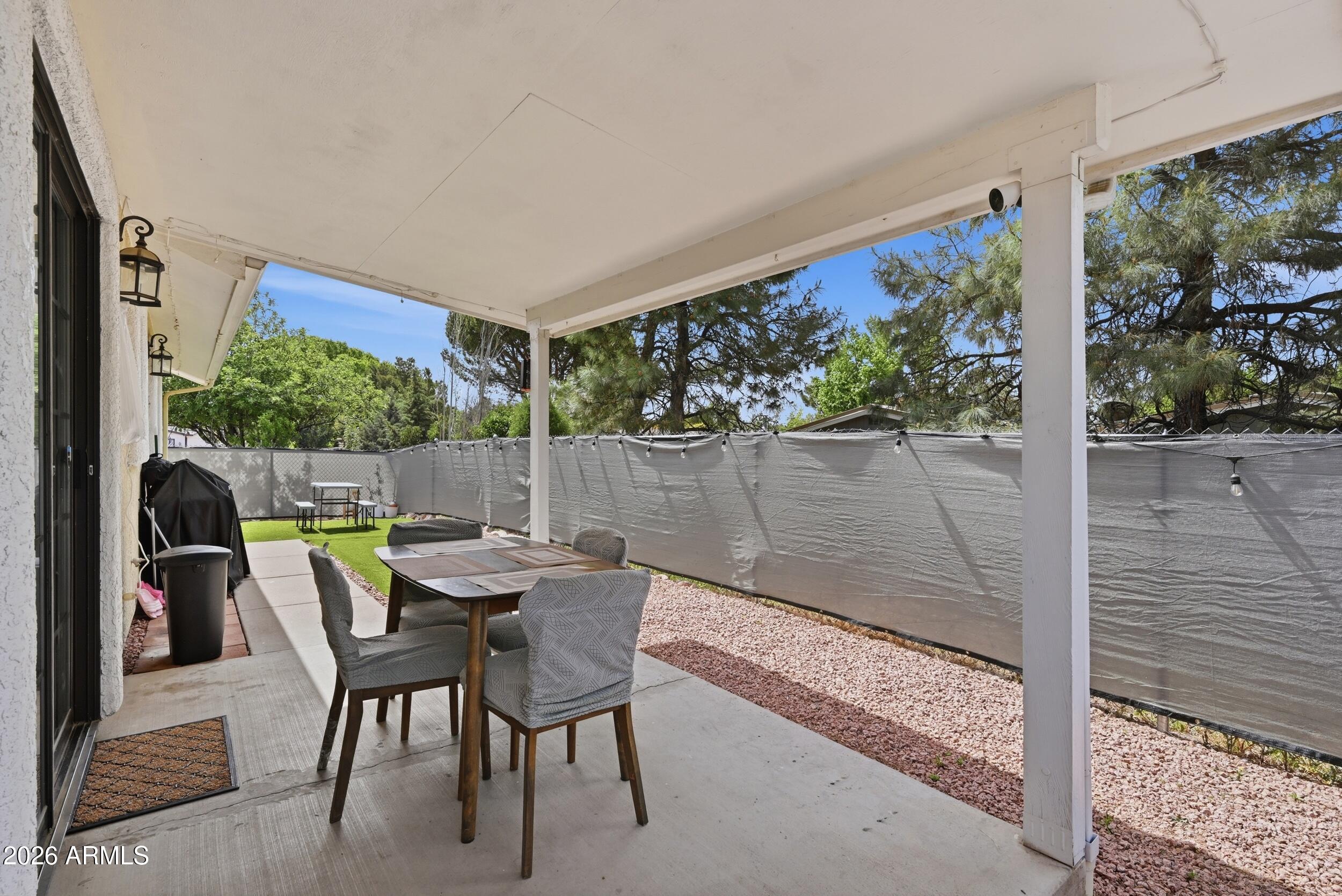 905 West Prairie Road Payson, AZ 85541 - Photo 25 of 38 a view of an outdoor dining space with a table and chairs