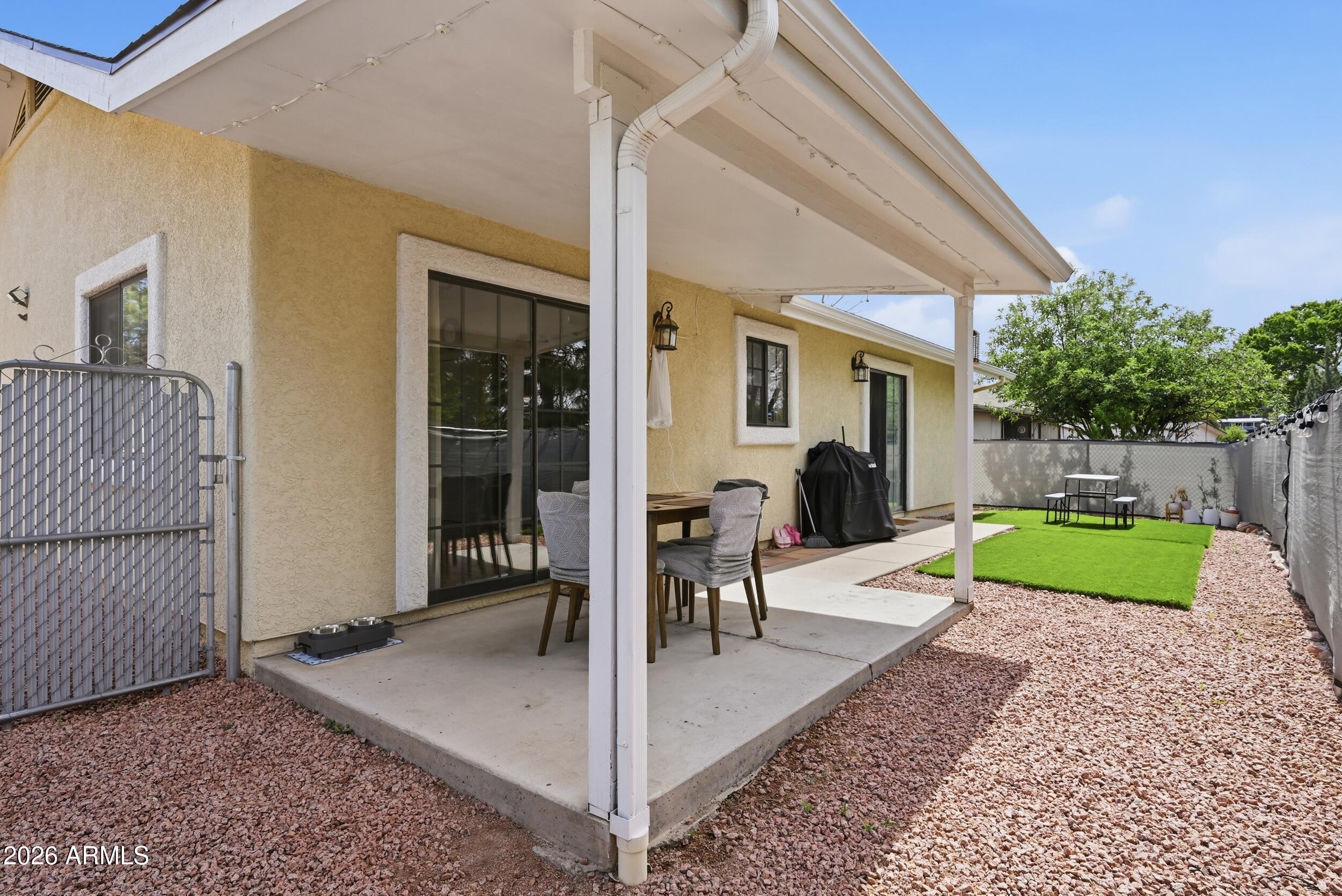 905 West Prairie Road Payson, AZ 85541 - Photo 26 of 38 a view of a house with backyard and porch