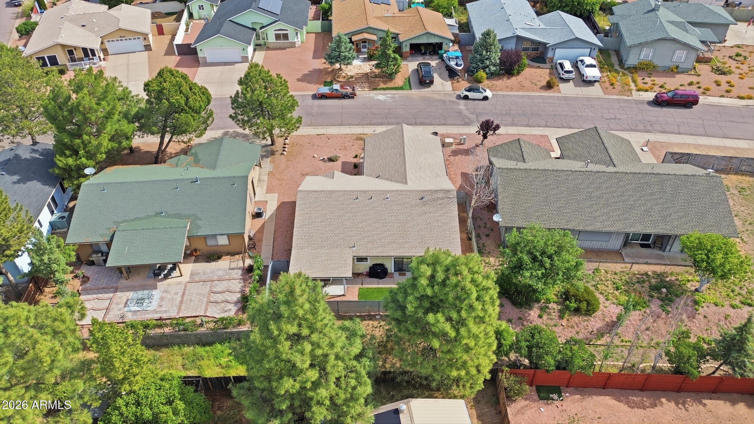 905 West Prairie Road Payson, AZ 85541 - Photo 30 of 38 an aerial view of multiple houses with a yard