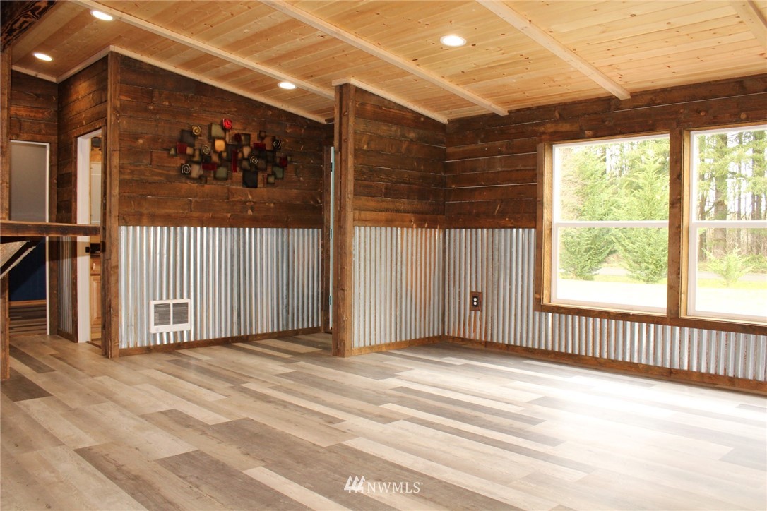 18337 Forstrom Street Southwest Rochester, WA 98579 - Photo 11 of 26 a view of a room with a large window