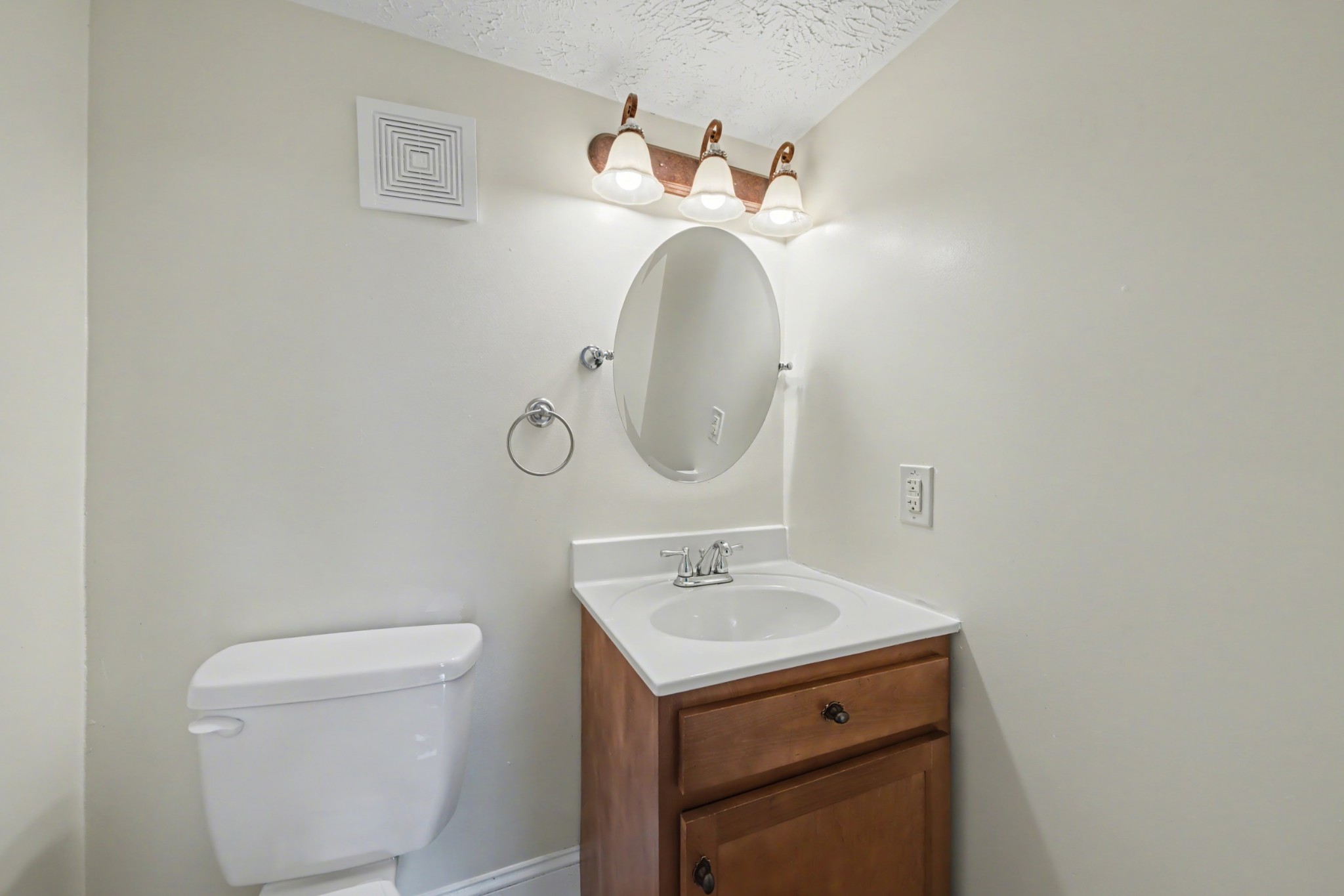 116 Tracy Academy Street Charlotte, TN 37036 - Photo 14 of 36 a bathroom with a sink and a mirror