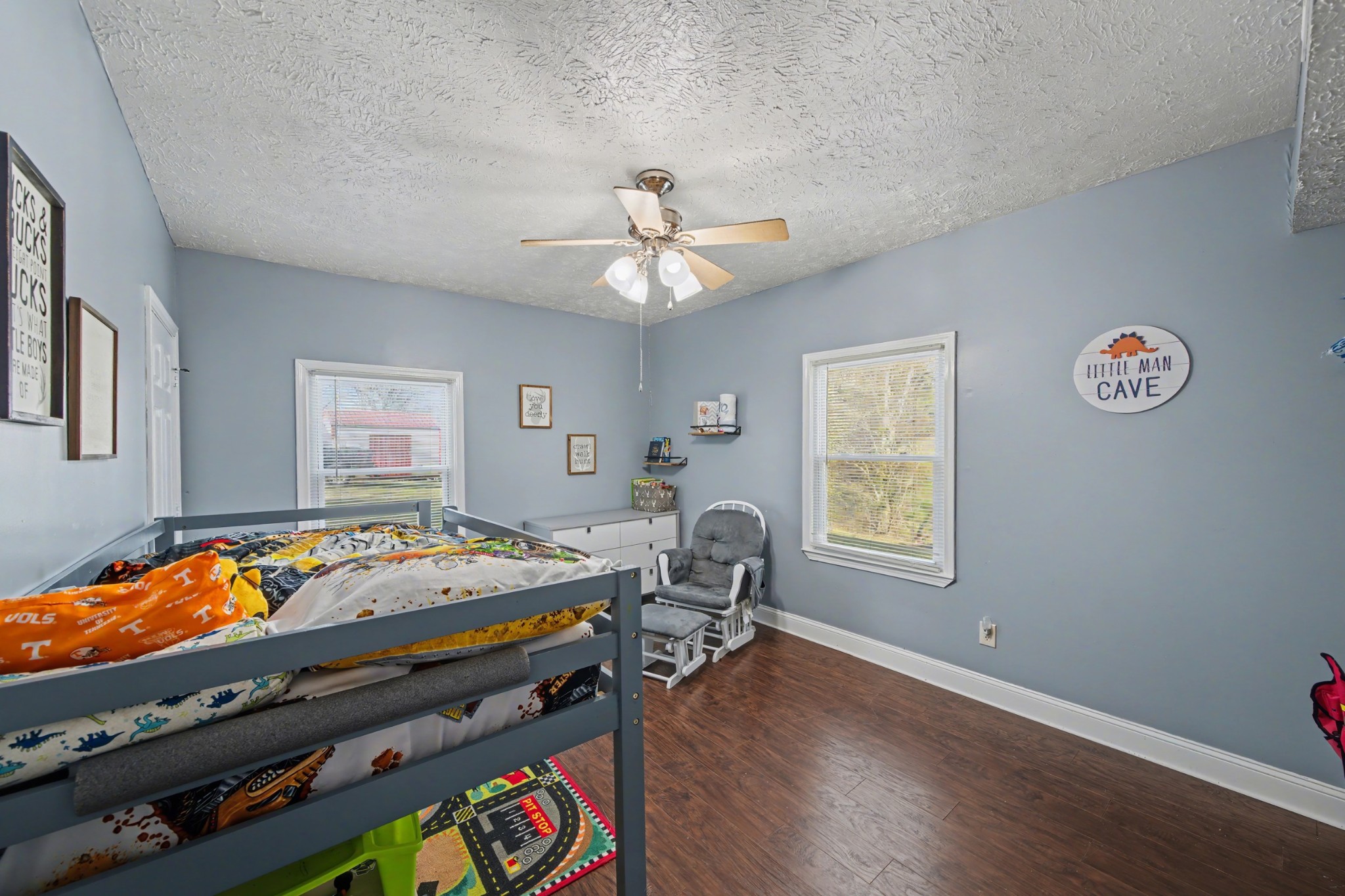 116 Tracy Academy Street Charlotte, TN 37036 - Photo 18 of 36 a bed room with furniture and a window