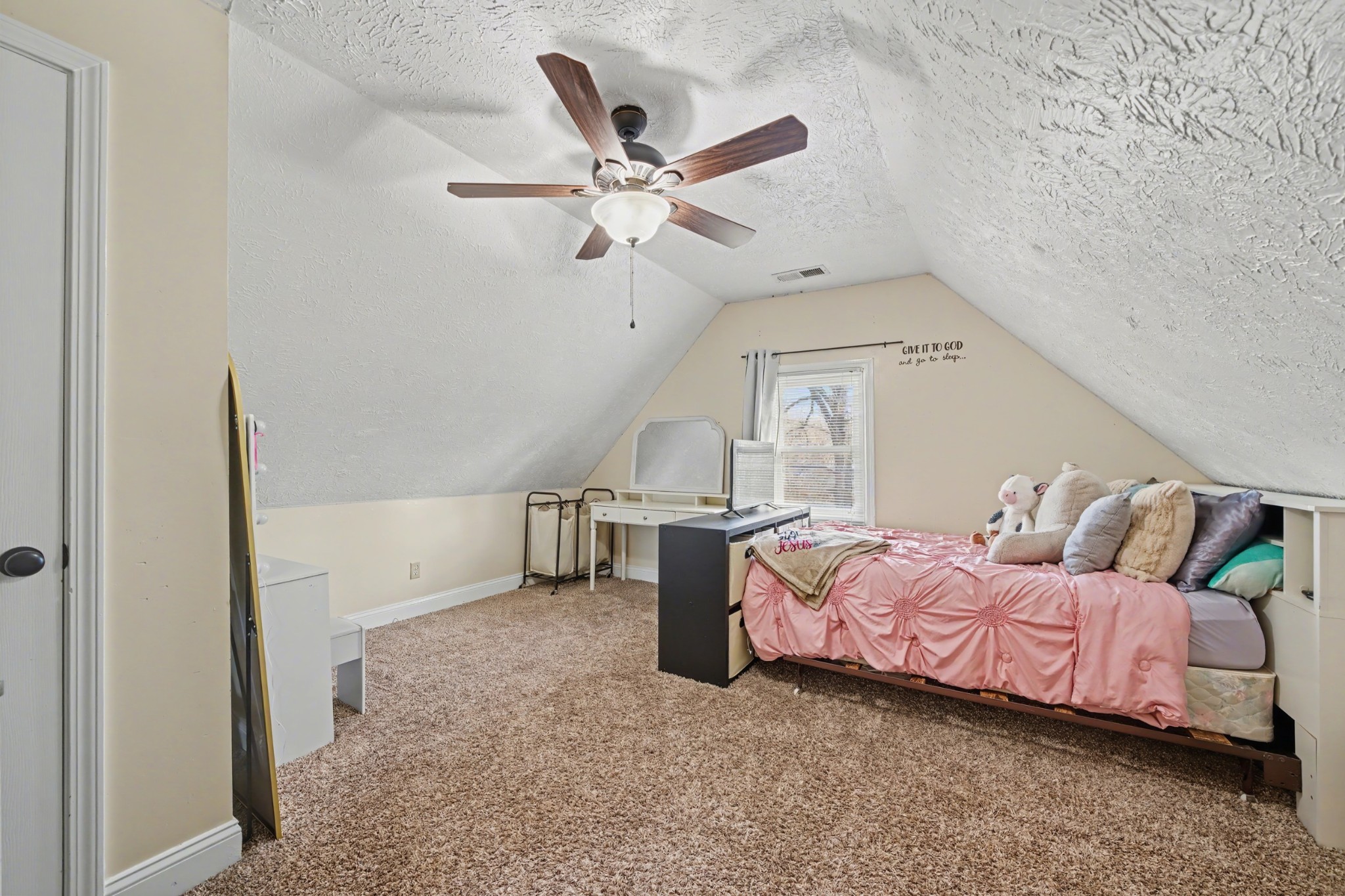 116 Tracy Academy Street Charlotte, TN 37036 - Photo 20 of 36 a bedroom with a bed and a ceiling fan