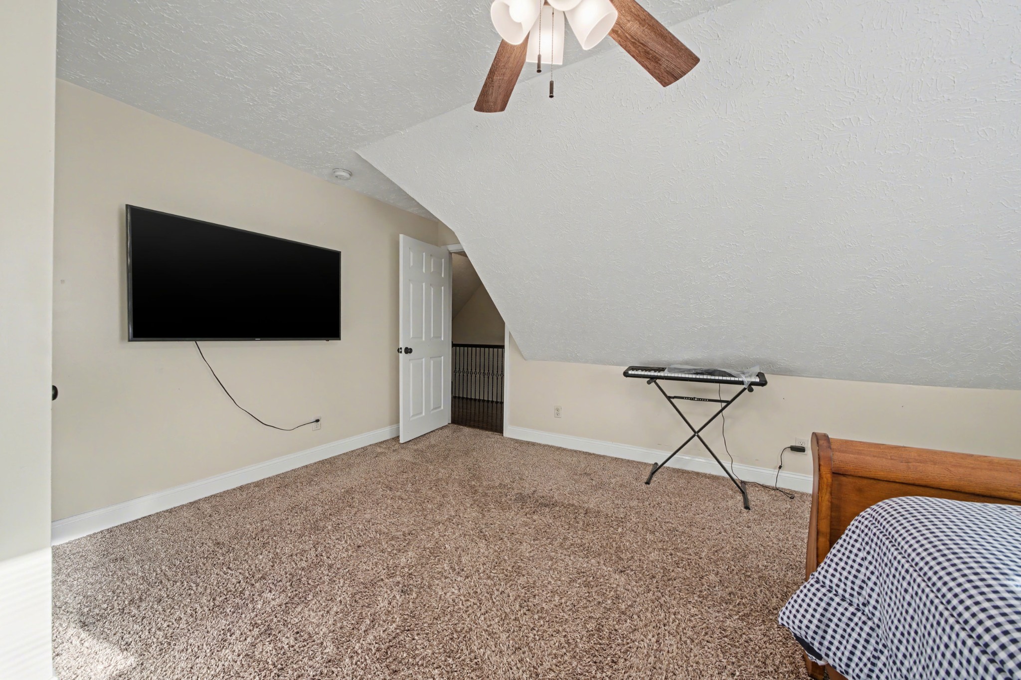 116 Tracy Academy Street Charlotte, TN 37036 - Photo 25 of 36 a living room with furniture and a flat screen tv
