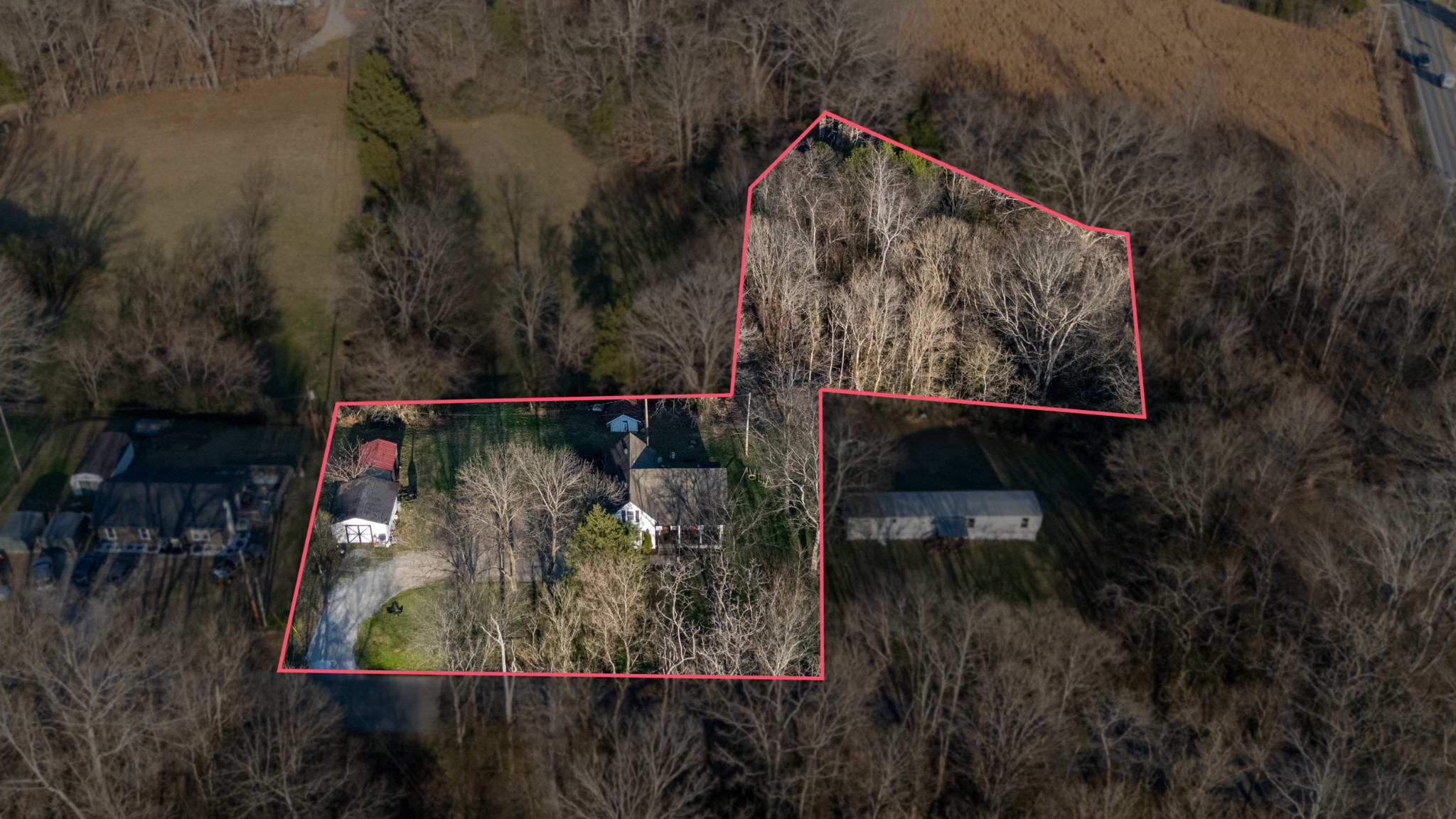 116 Tracy Academy Street Charlotte, TN 37036 - Photo 32 of 36 an aerial view of a houses with outdoor space