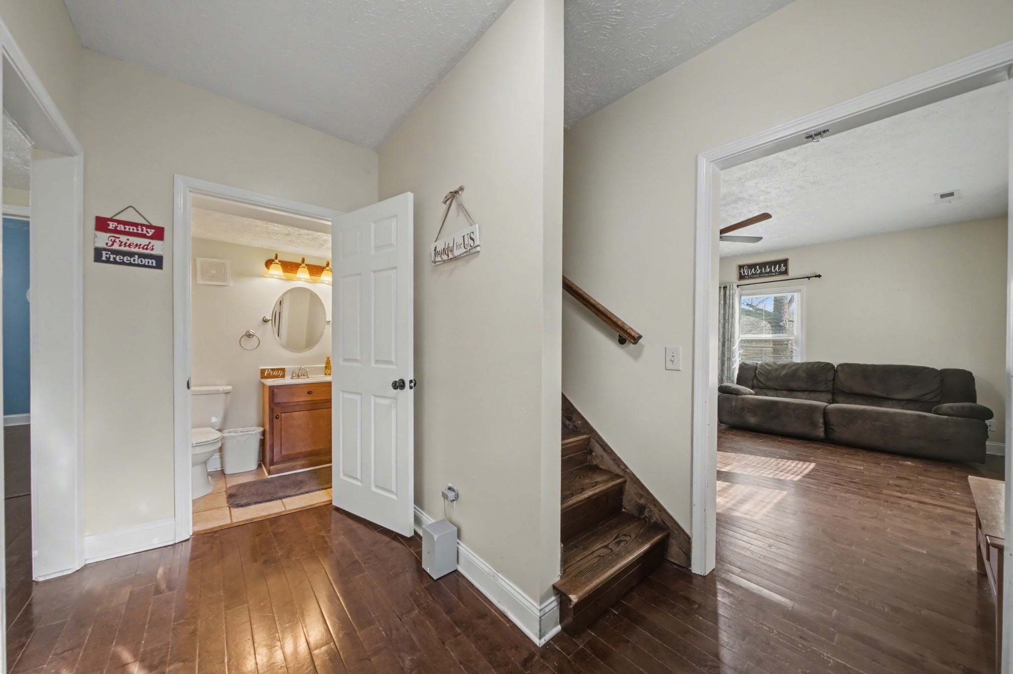 116 Tracy Academy Street Charlotte, TN 37036 - Photo 5 of 36 a living room with furniture and a wooden floor