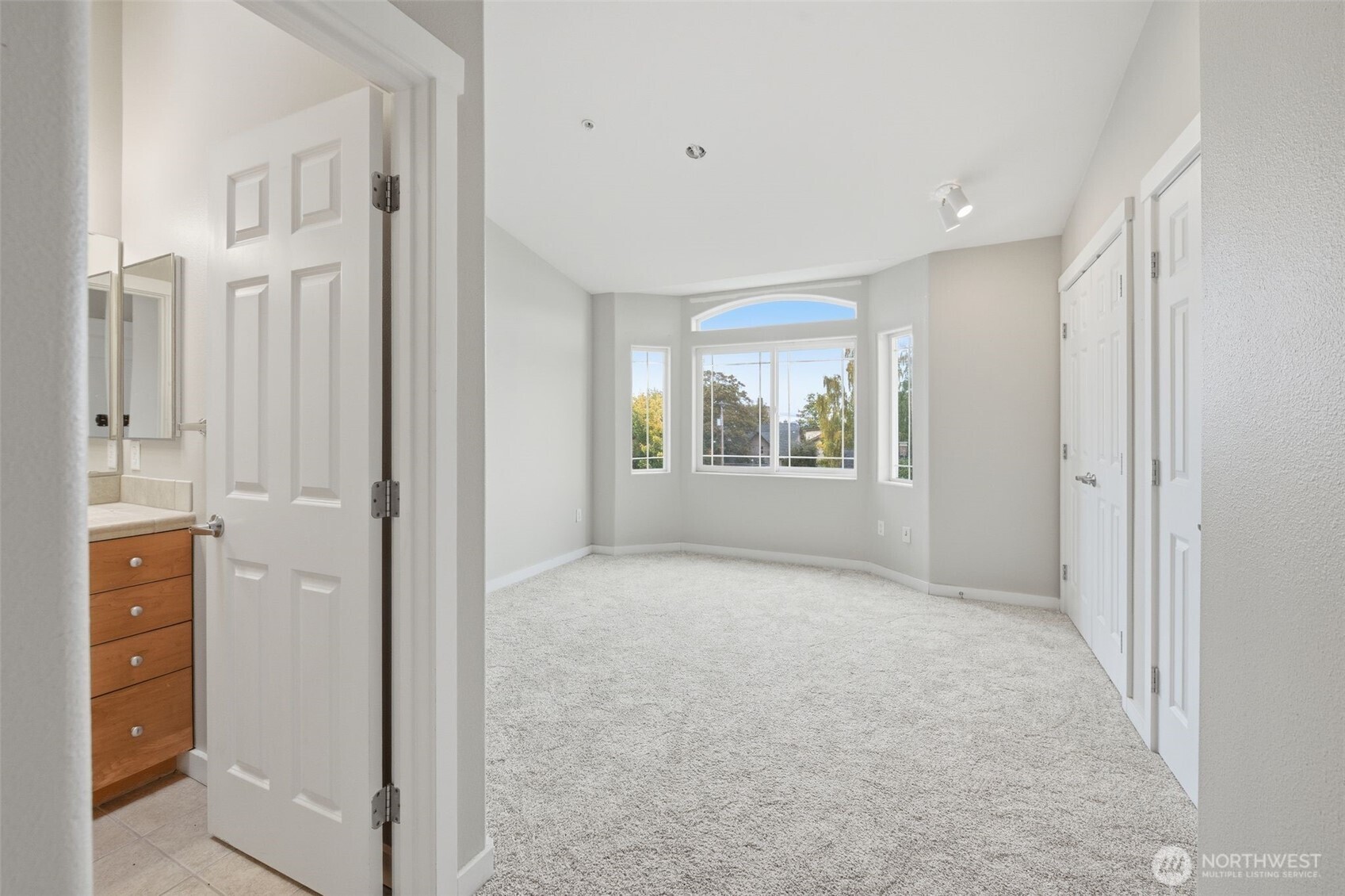 210 North G Street, Unit D Tacoma, WA 98403 - Photo 11 of 19 a view of an empty room with a window