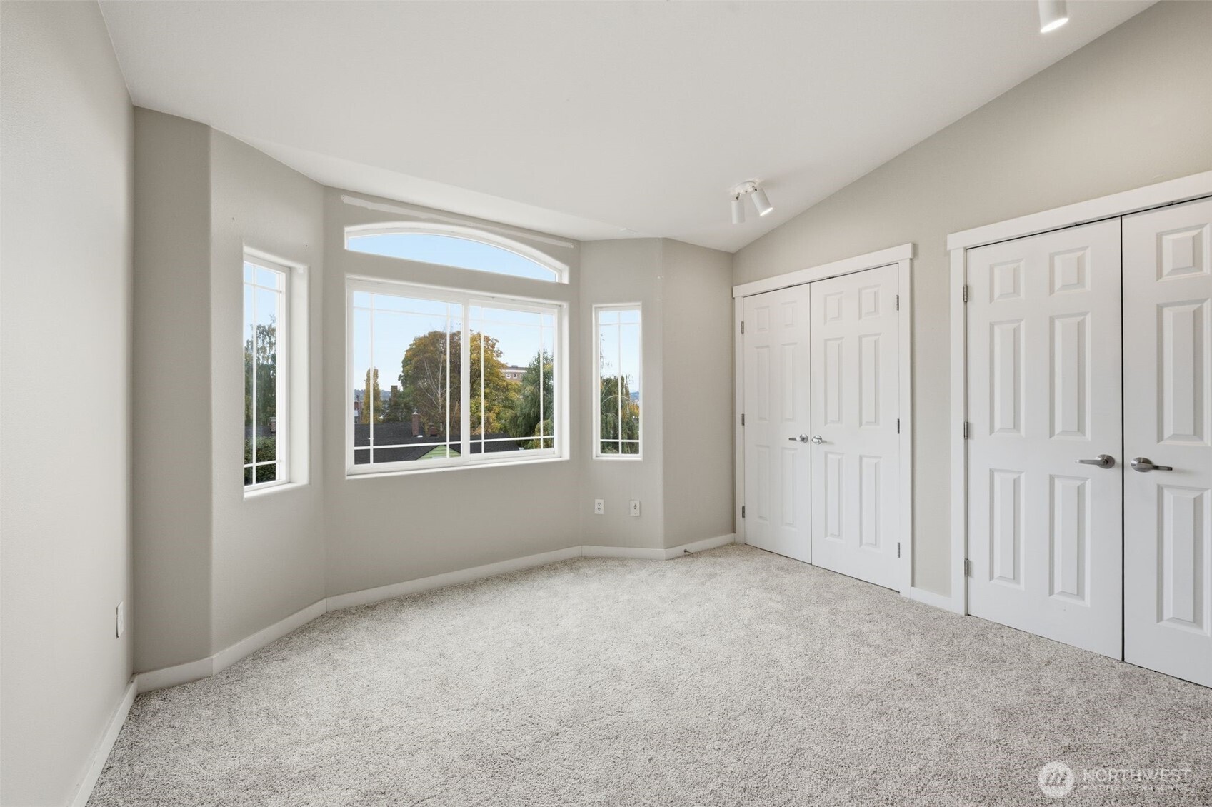 210 North G Street, Unit D Tacoma, WA 98403 - Photo 12 of 19 a view of an empty room with a window