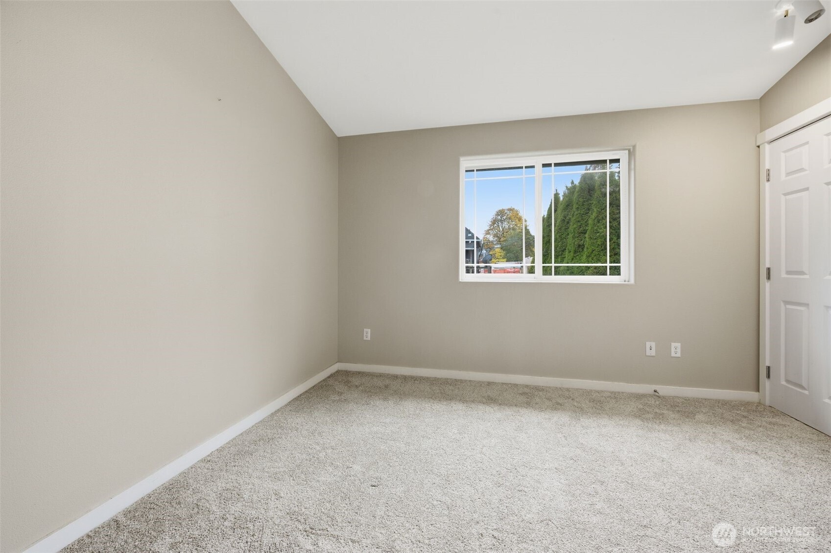 210 North G Street, Unit D Tacoma, WA 98403 - Photo 14 of 19 an empty room with windows