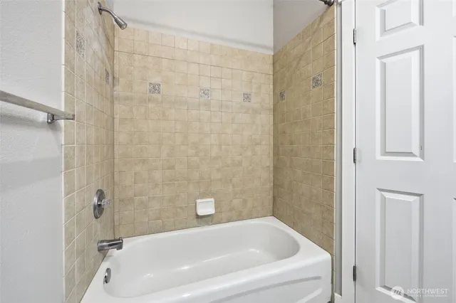 a bathroom with a bathtub