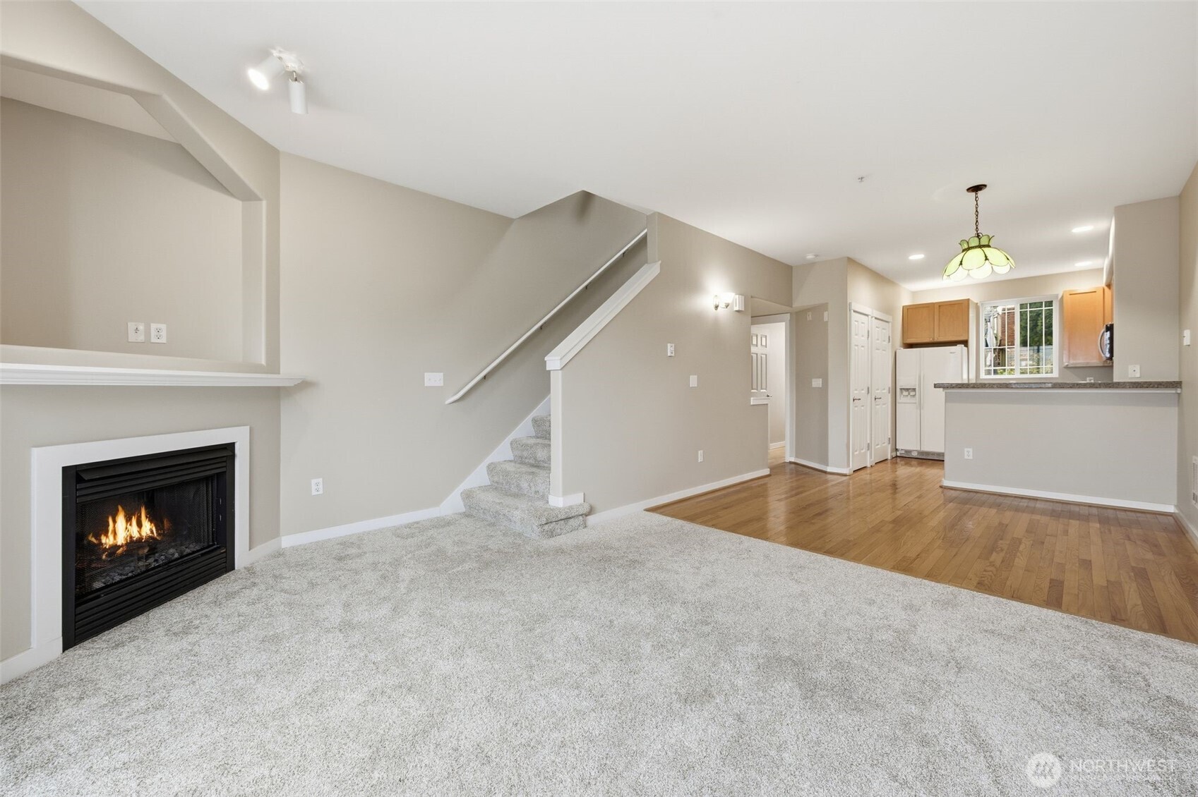 210 North G Street, Unit D Tacoma, WA 98403 - Photo 4 of 19 a view of an empty room with a fireplace