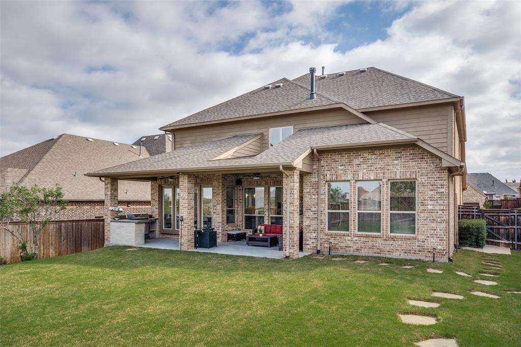 1011 Riviera Road Roanoke, TX 76262 - Photo 26 of 28 Rear exterior with extended covered patio