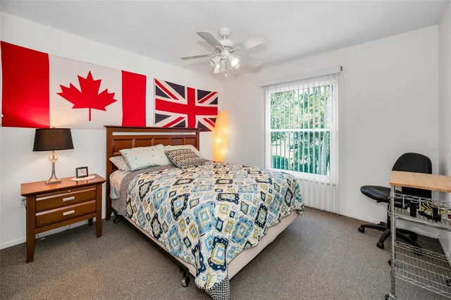 a view of a house with a yard and porch