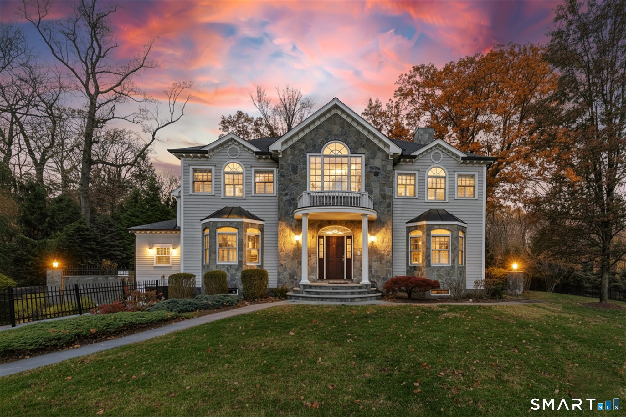 139 Jelliff Mill Road New Canaan, CT 06840 - Photo 1 of 1 a front view of a house with a garden