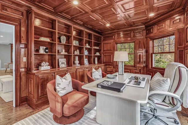 a living room with furniture and a table