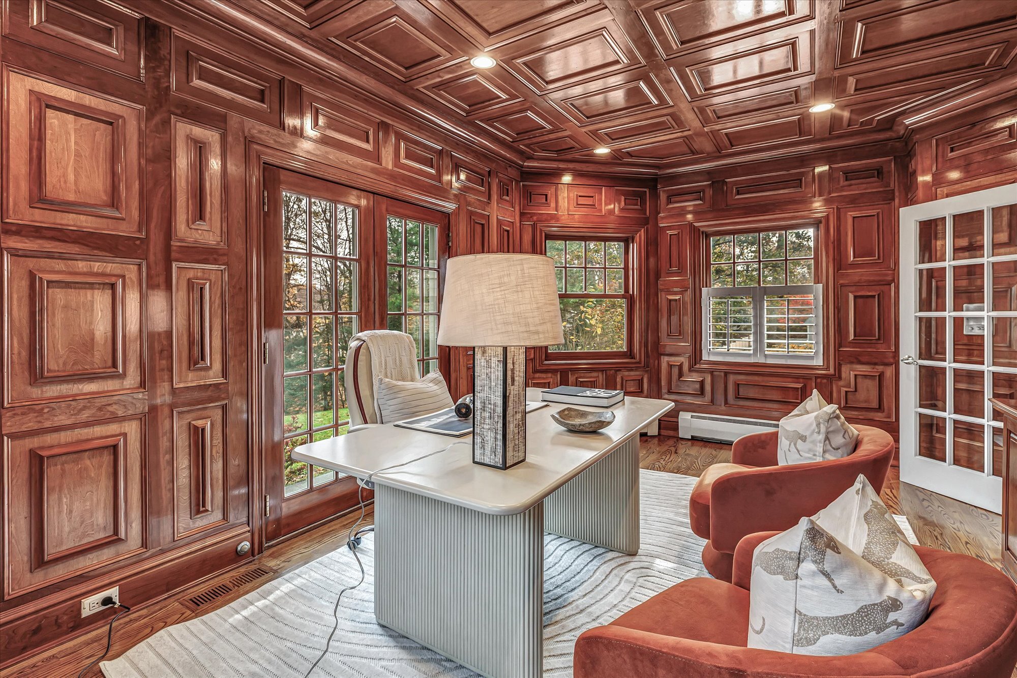 139 Jelliff Mill Road New Canaan, CT 06840 - Photo 17 of 40 a living room with furniture and a chandelier